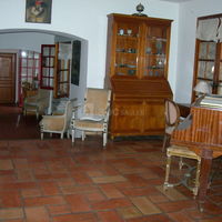 Vue intérieure en enfilade du salon , salle à manger, cuisine à l'américaine
