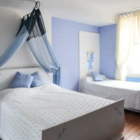 Chambre bleu clair dans le gîte mesange