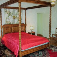 Gîte : Lit à baldaquin