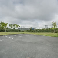 Extérieur Arrière parking et jardin