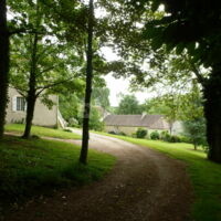Entrée de la propriété par le parc