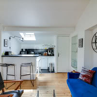Plateau Supérieur - Espace canapé et cuisine