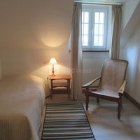 Chambre single dans les communs