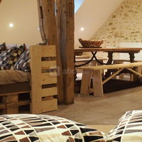 Pièce de vie dans le loft de l'écurie