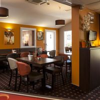 Salle de petit déjeuner du Brit Hotel Foix