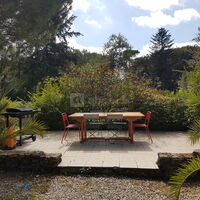Terrasse table extensible de 12 personnes