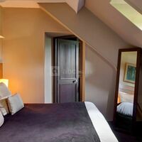 Chambre twin faite en grand lit