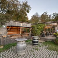 La Terrasse couverte et son bar