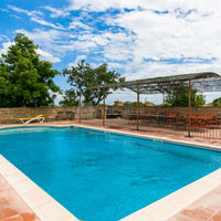 La piscine et la pergola du Grand Belric