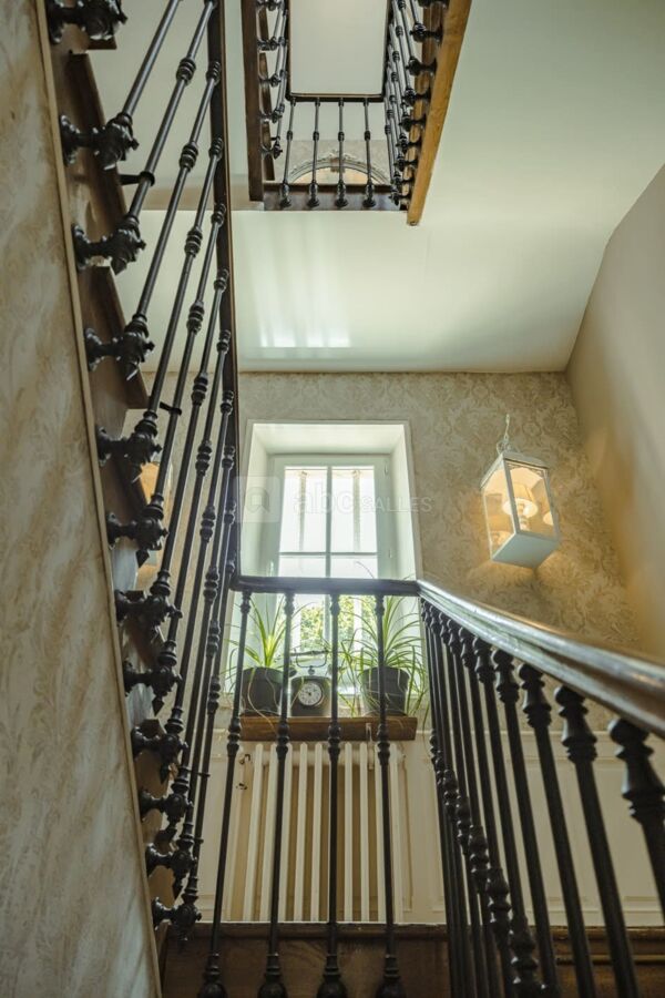 Escalier menant aux chambres