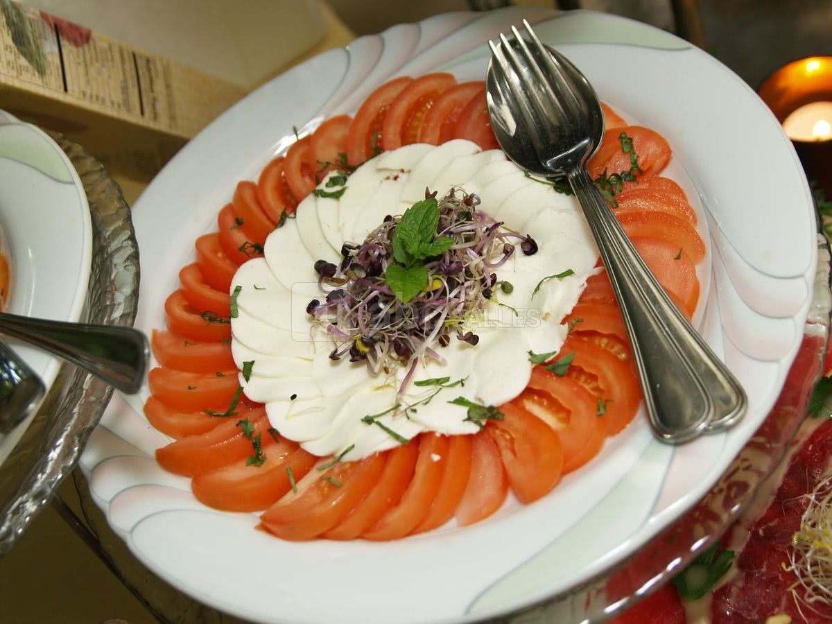 Carpaccio de tomates mozzarella