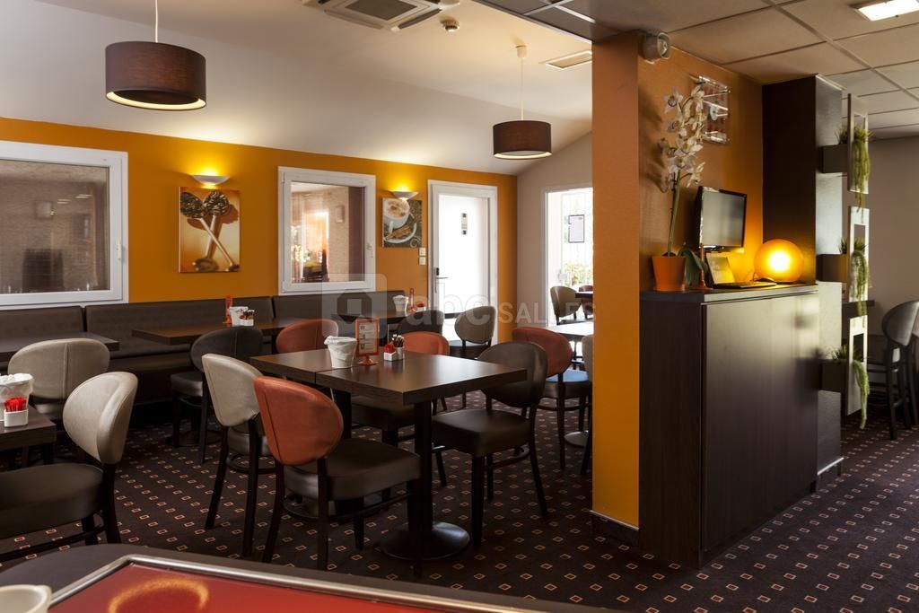 Salle de petit déjeuner du Brit Hotel Foix