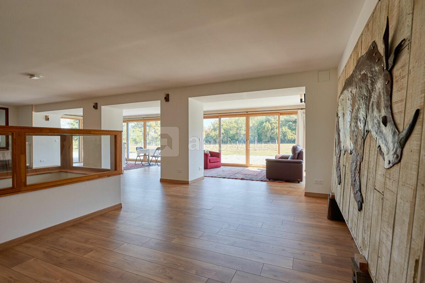 Espace véranda avec petit salon en continuité