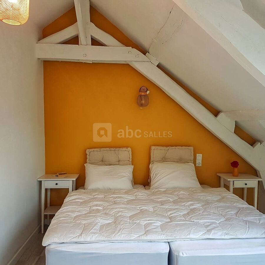 Chambre jaune 2 lits simples