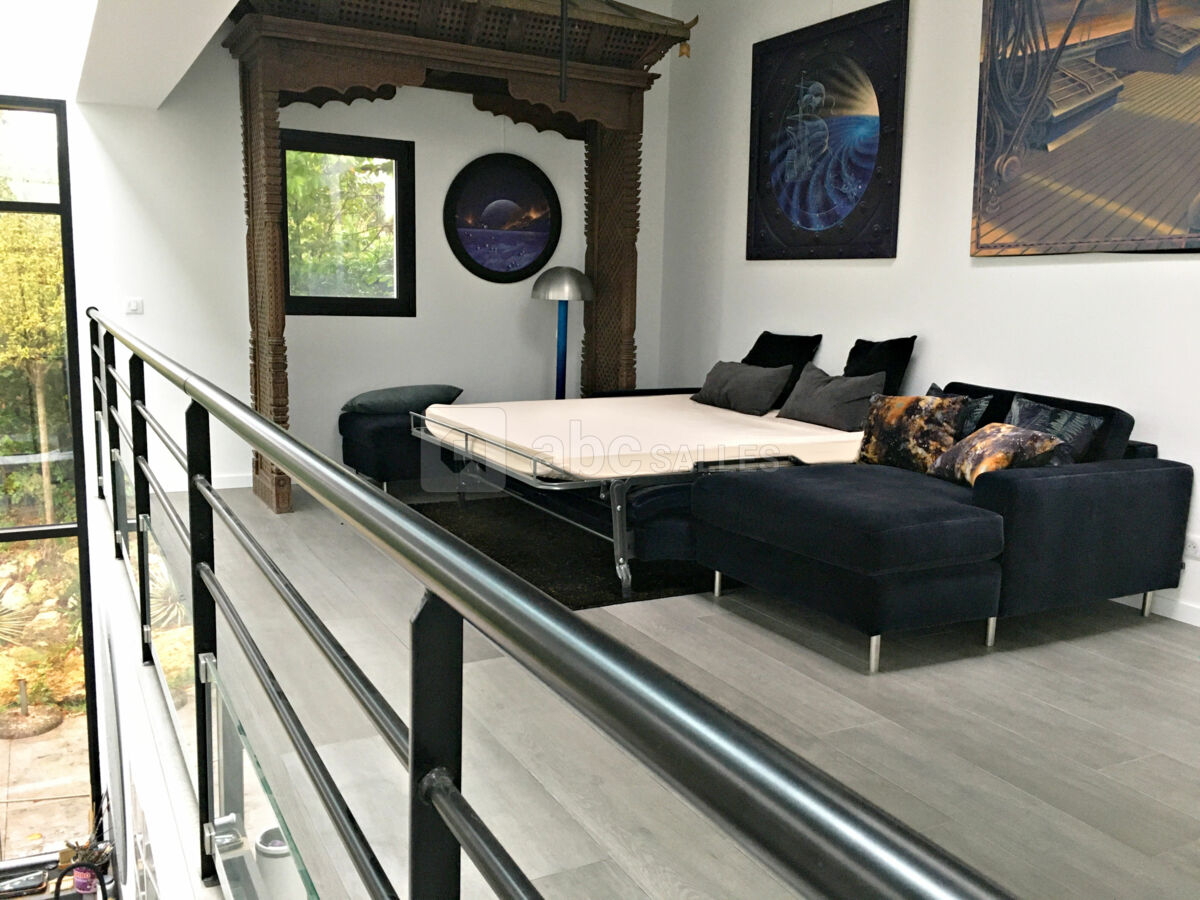 Mezzanine. Canapé-lit déplié